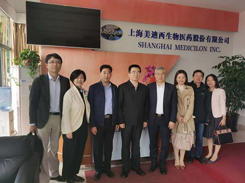 中国药科大学党委书记金能明与esball首席执行官陈春麟博士